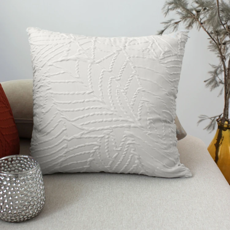Coussin carré feuillage aspect gaufré