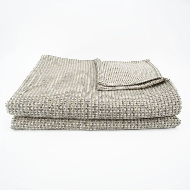 Dessus de lit tissé en coton recyclé motif nid d’abeille