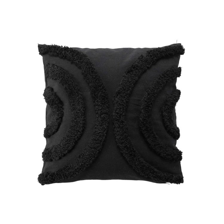 Coussin déhoussable aux motifs tuftés