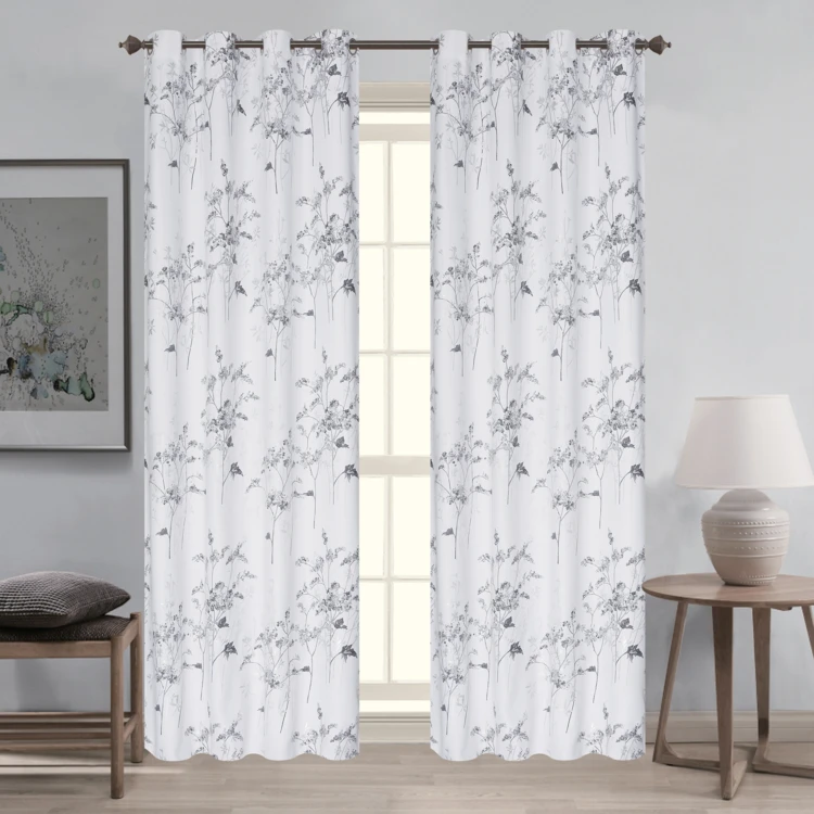 Par de cortinas opacas con ojales y estampado vegetal