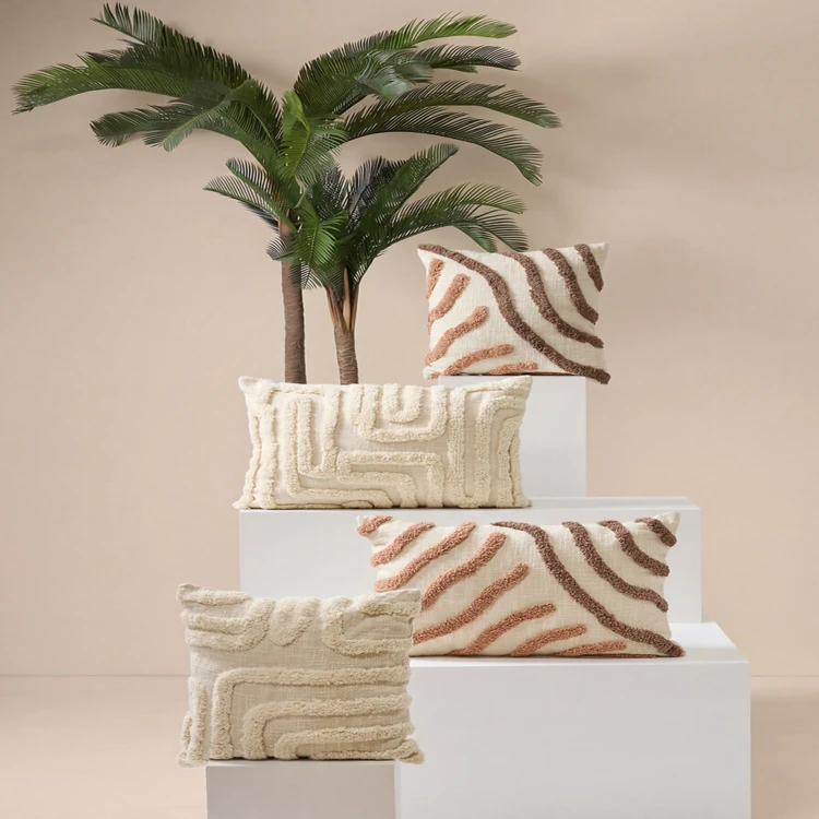 Coussin décoratif tufté en coton à motifs en relief
