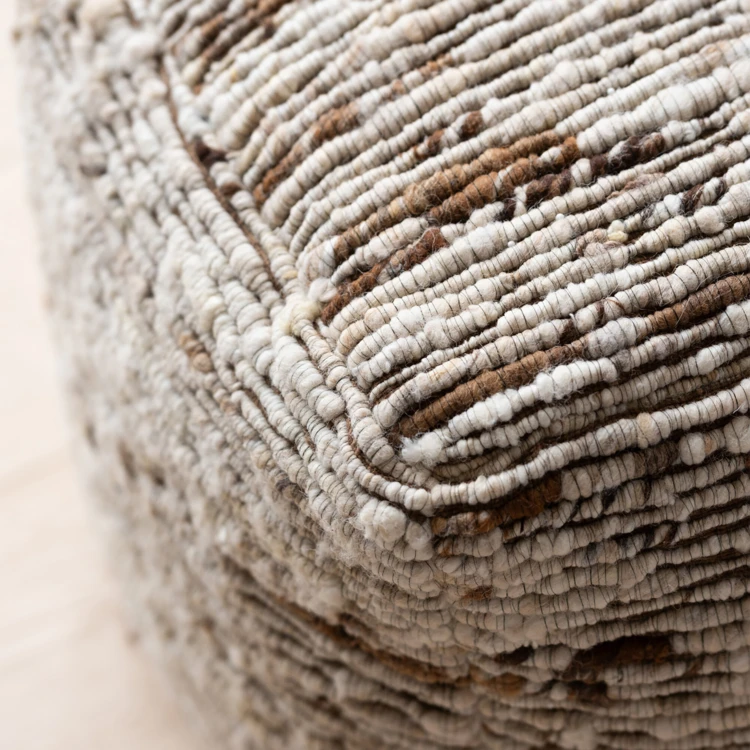 Pouf tissé en laine