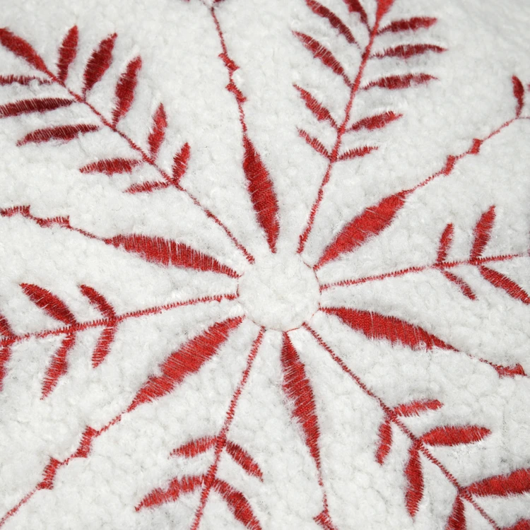 Coussin effet bouclette avec motif flocon