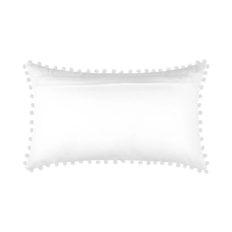 Coussin rectangulaire en coton déhoussable à pompons
