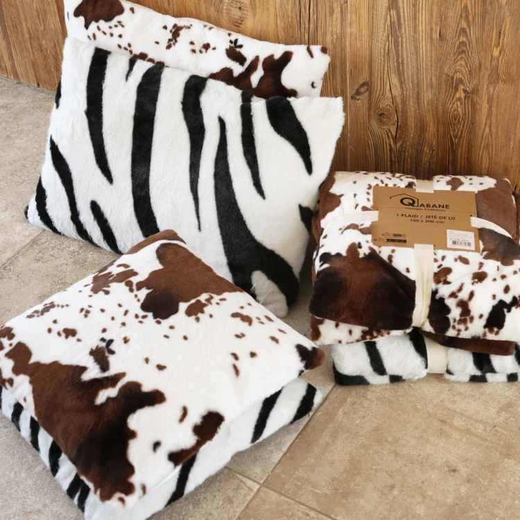 Plaid doux à motif peau de vache avec dos en velours