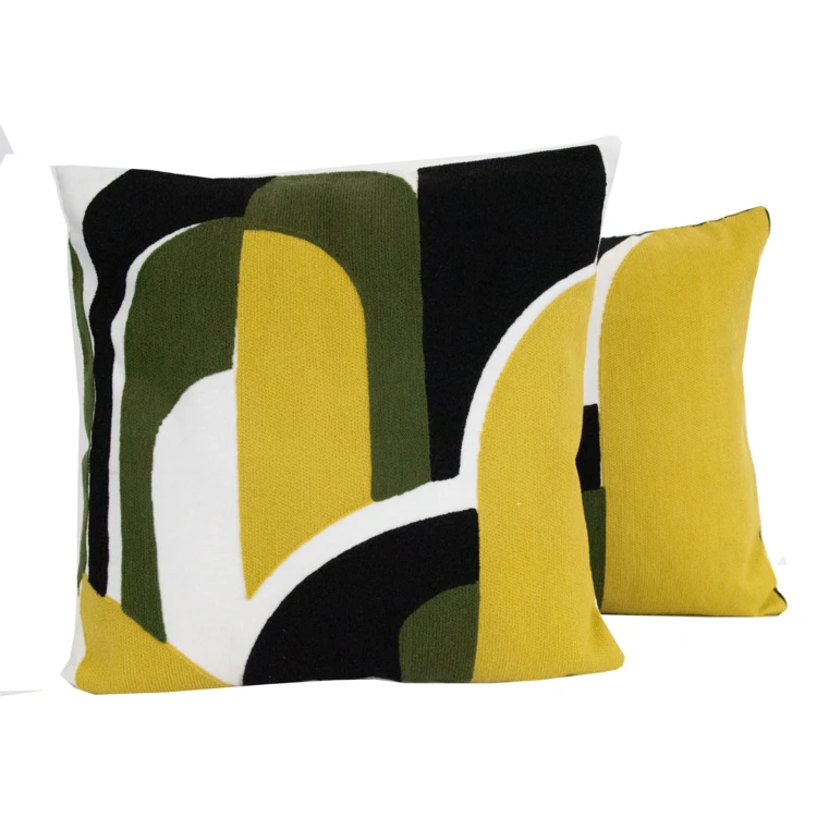 Coussin brodé en relief motif abstrait