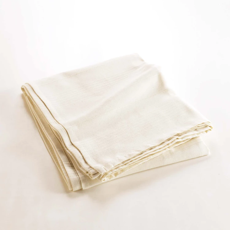 Plaid uni en polycoton pour canapé ou lit