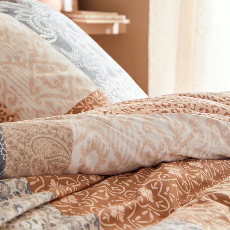 Juego de cama reversible de algodón con estampado patchwork