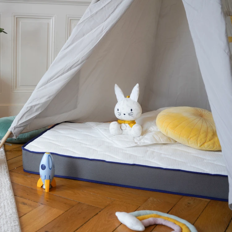 Matelas bébé face été / face hiver avec garnissage laine et soutien ferme