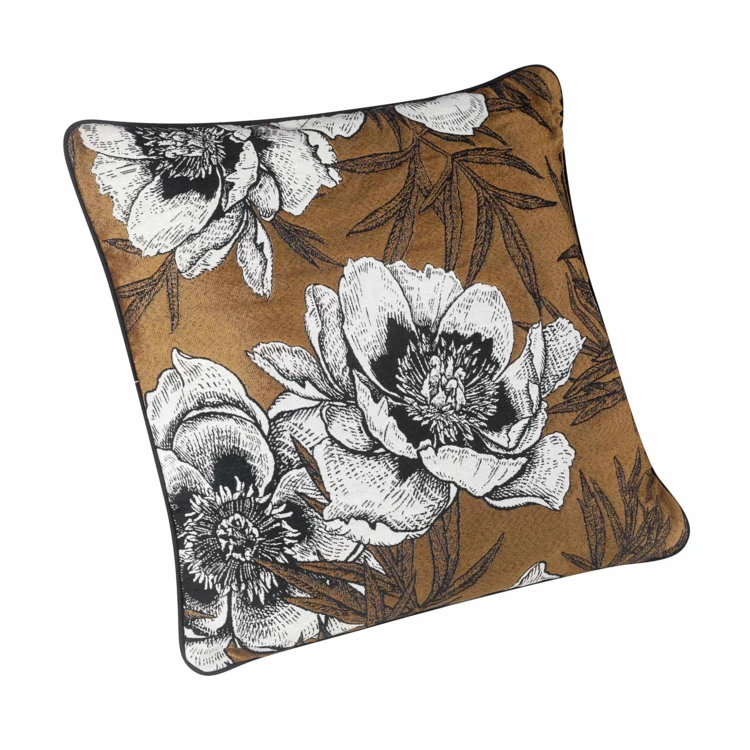 Coussin passepoilé aux impressions florales