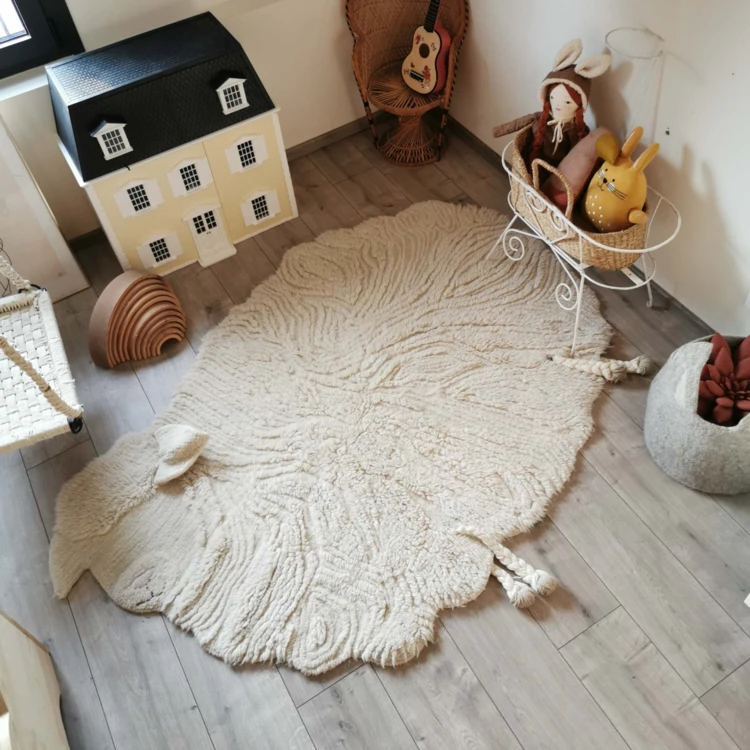 Tapis lavable en laine mouton au nez rose