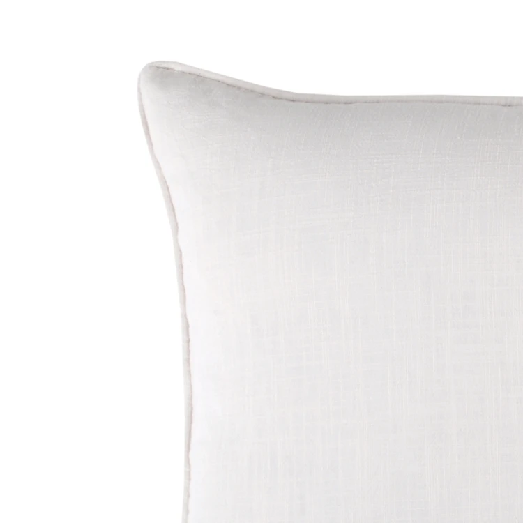 Coussin Windsor passepoilé uni