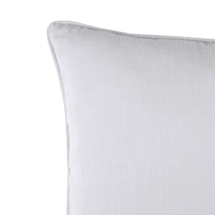 Coussin Windsor passepoilé uni