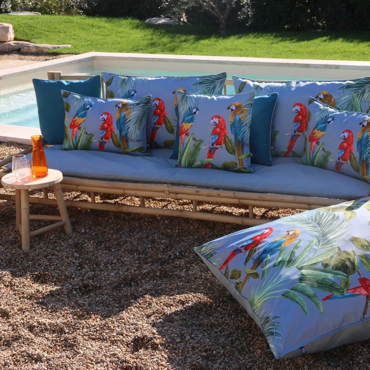 Coussin outdoor imprimé perroquets