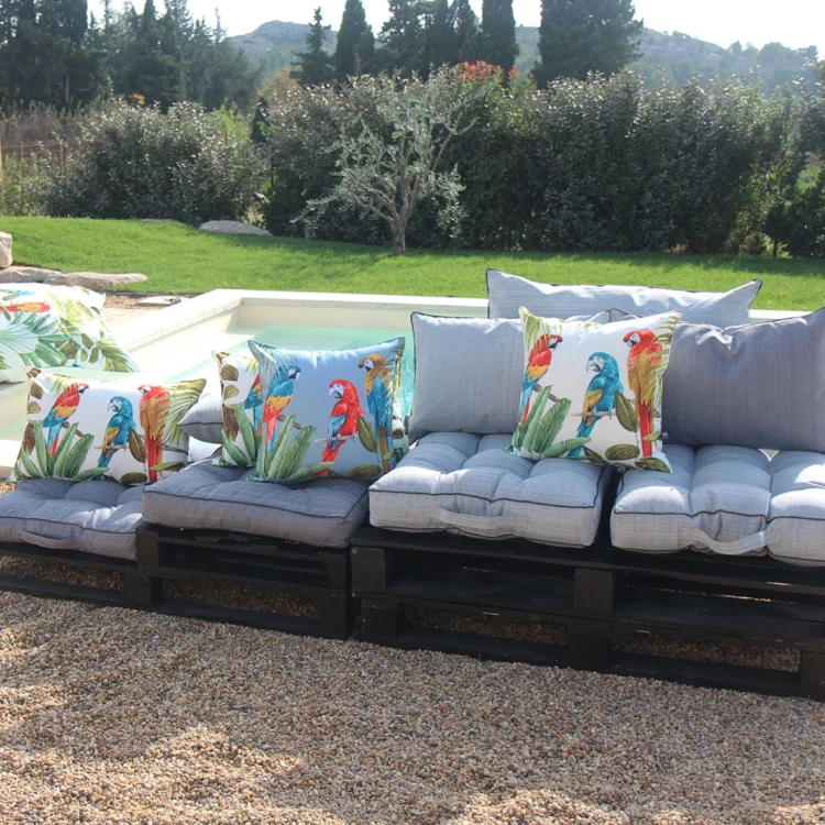 Coussin outdoor imprimé perroquets