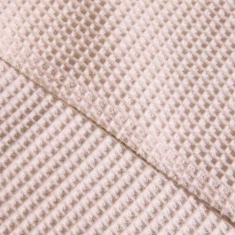 Dessus de lit tissé en coton recyclé motif nid d’abeille