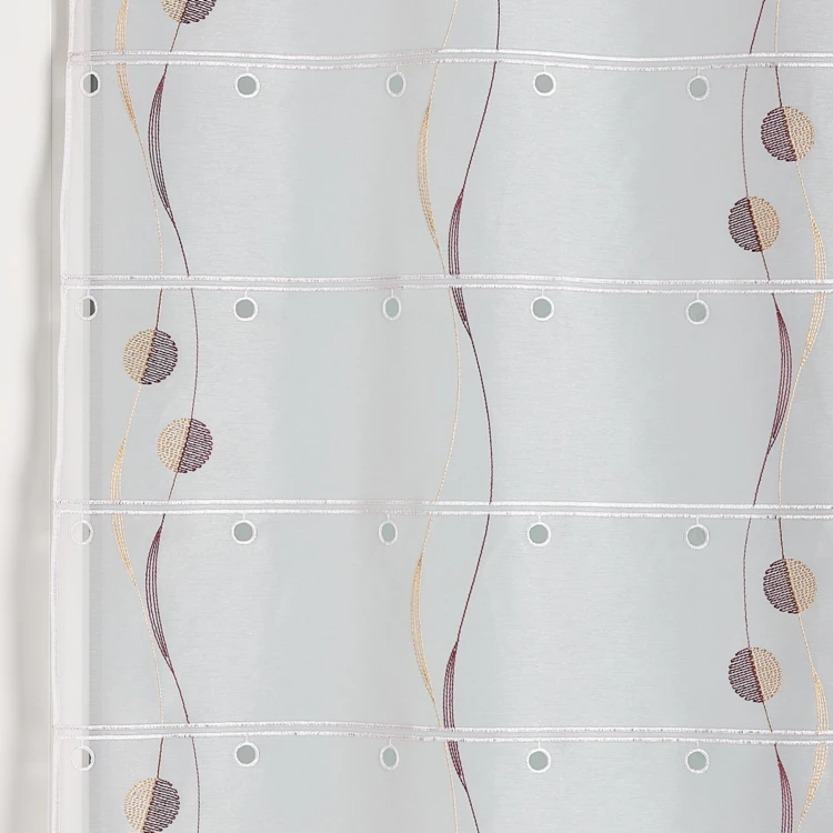 Modulable brodé avec motifs ronds et vagues