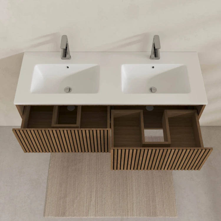 Meuble de salle de bain suspendu avec façade crantée et vasque encastrée
