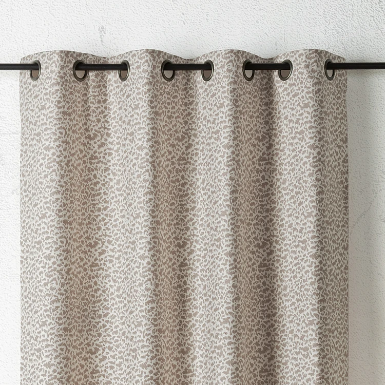 Rideau jacquard abstrait texturé à oeillets