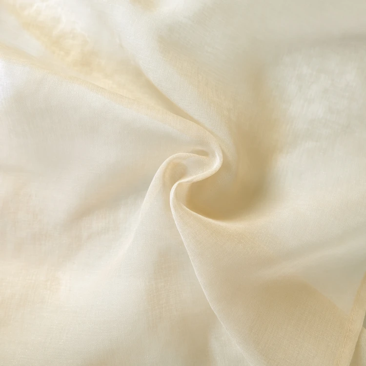 Voilage uni à œillets