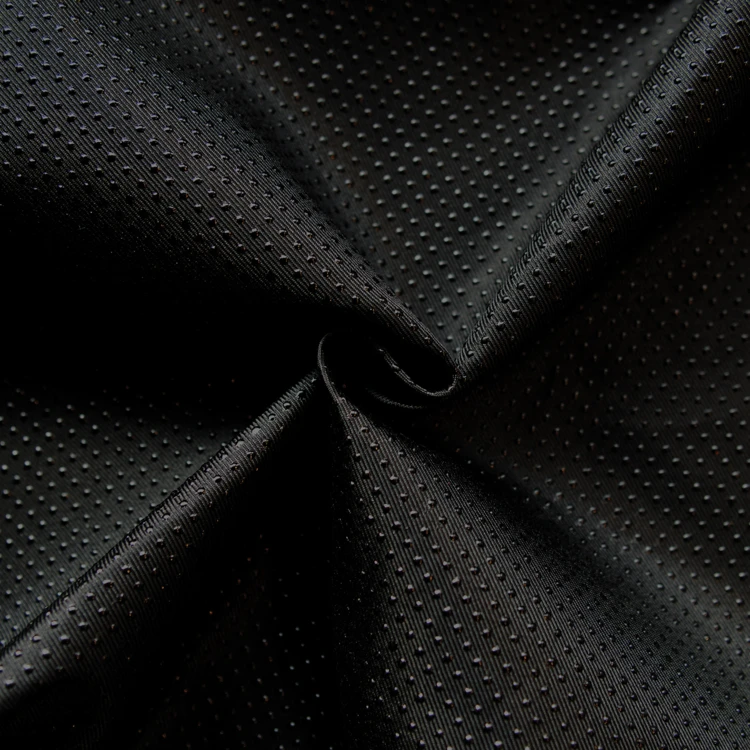 Tissu antidérapant motif pois en relief