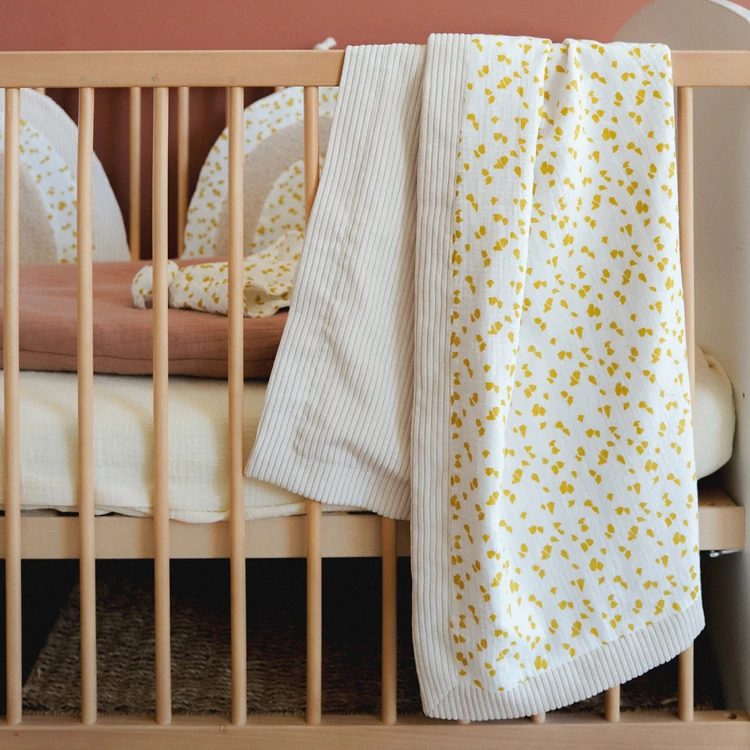 Couverture réversible esprit safari pour bébé