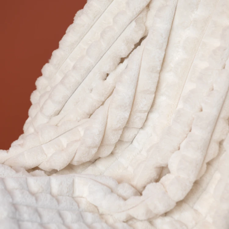 Tissu fausse fourrure effet matelassé