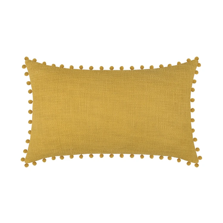 Coussin rectangulaire en coton déhoussable à pompons