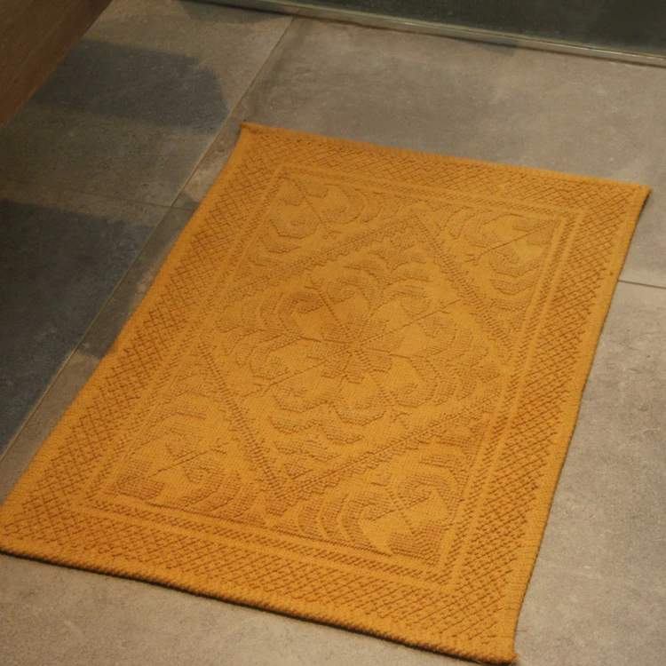 Tapis de bain à motif géométrique