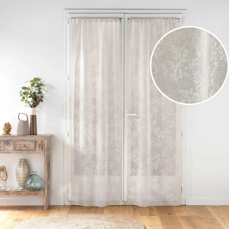 Paire de voilages passe-tringle en voile tissé motif feuillage