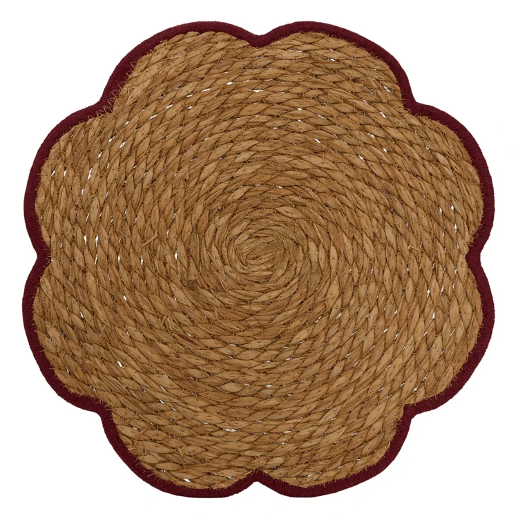 Mantel individual de junco trenzado con forma floral
