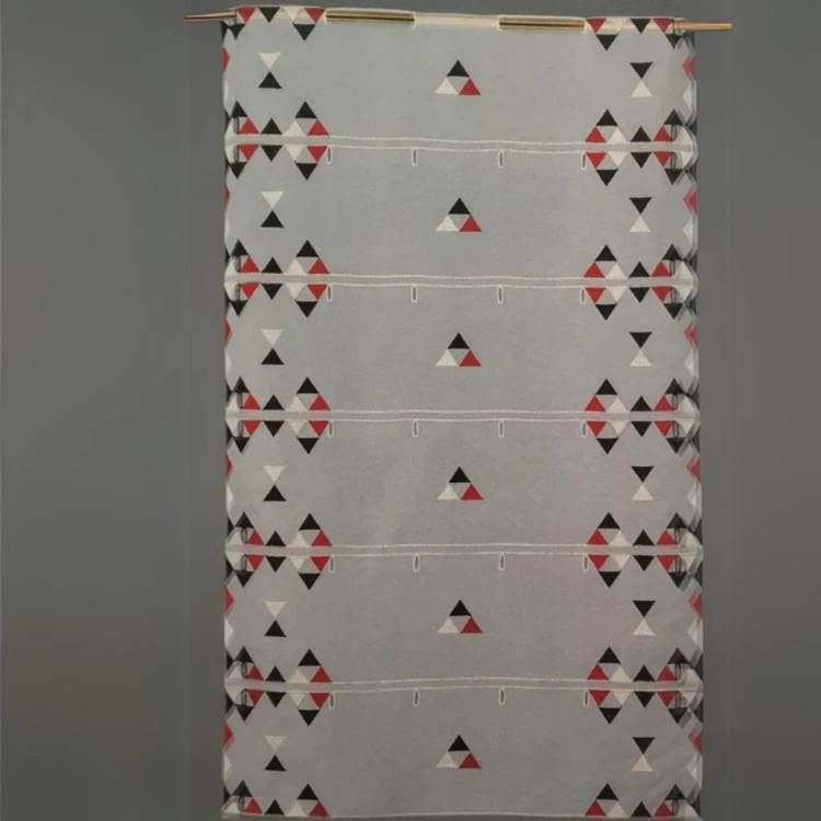 Modulable en voile brodé de triangles colorés