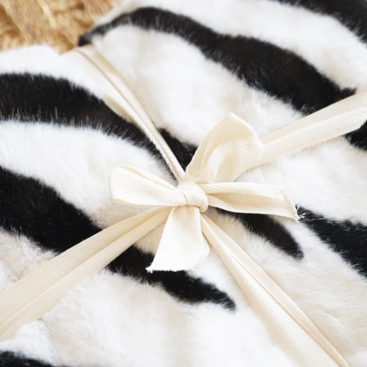 Plaid doux à motif zèbre avec dos en velours