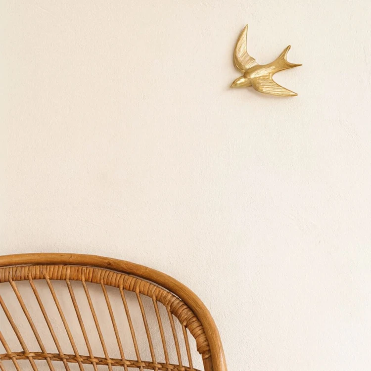 Decoración de pájaro dorado