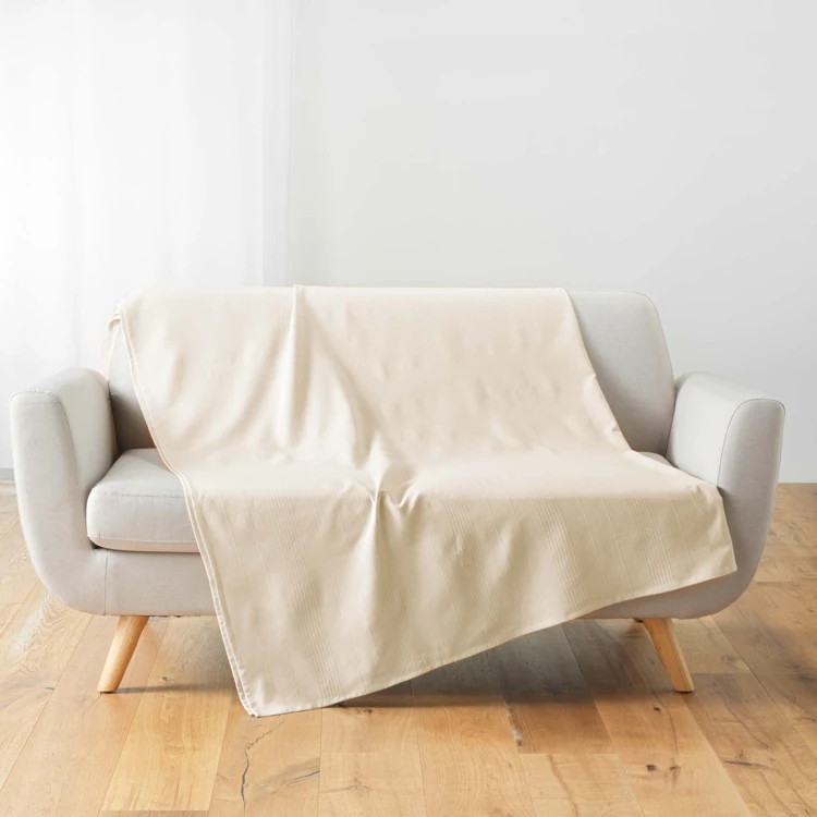 Plaid uni en polycoton pour canapé ou lit
