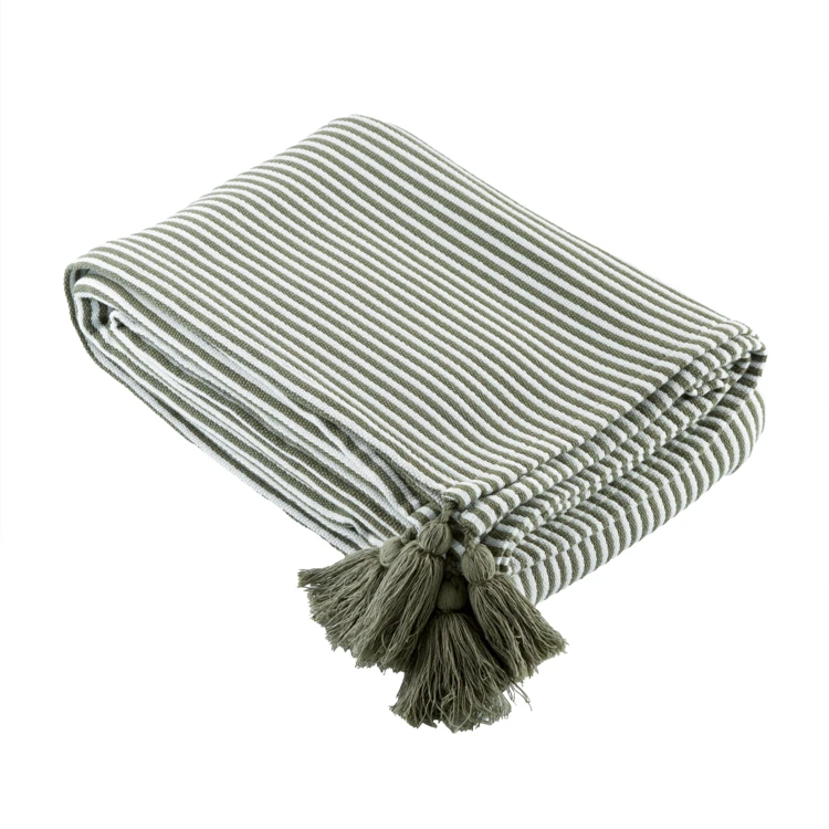 Plaid rayé à pompons