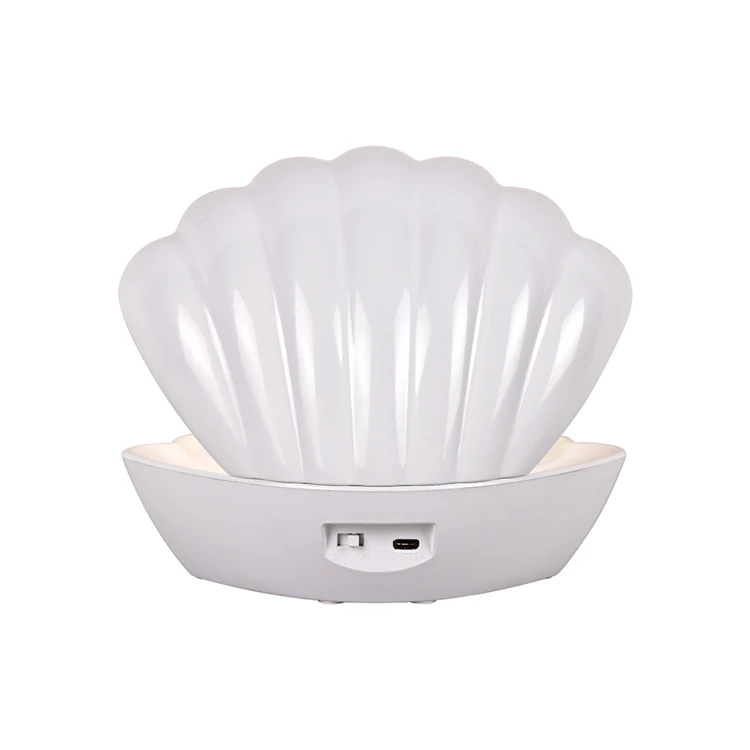 Leuchtende Muschellampe mit Glitzereffekt