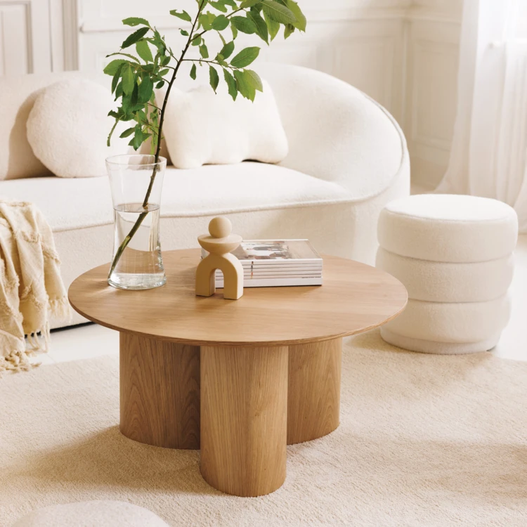 Mesa de centro redonda con aspecto de madera y base cilíndrica