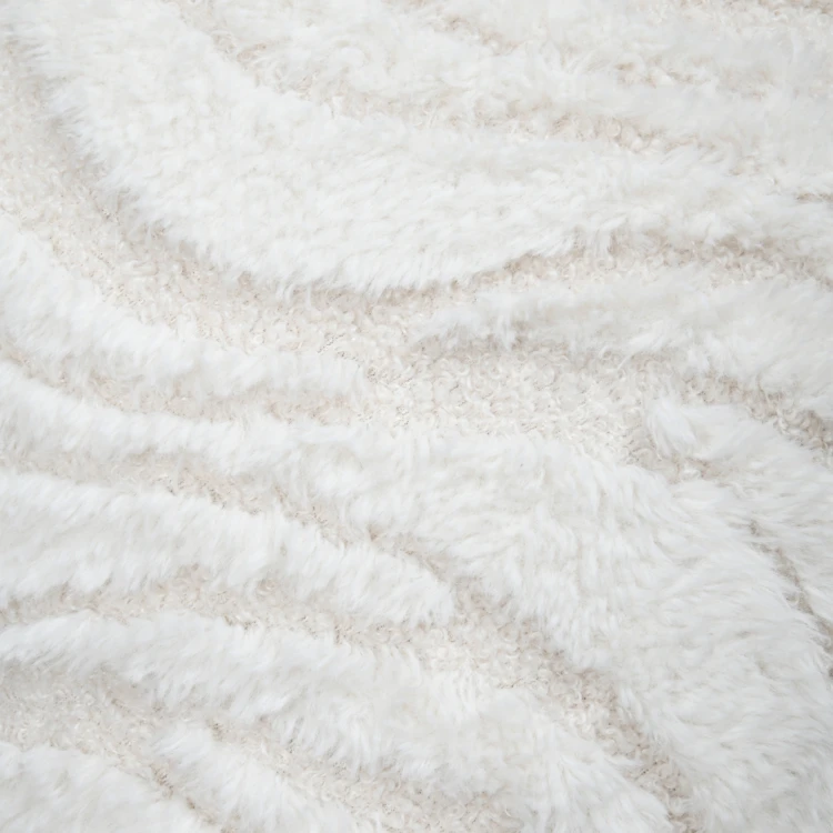 Coussin effet fourrure vagues