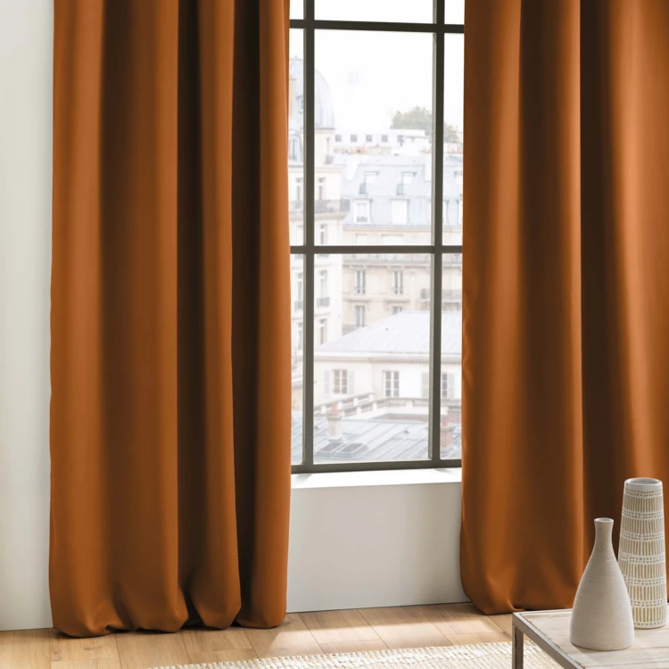 Rideau occultant uni à oeillets