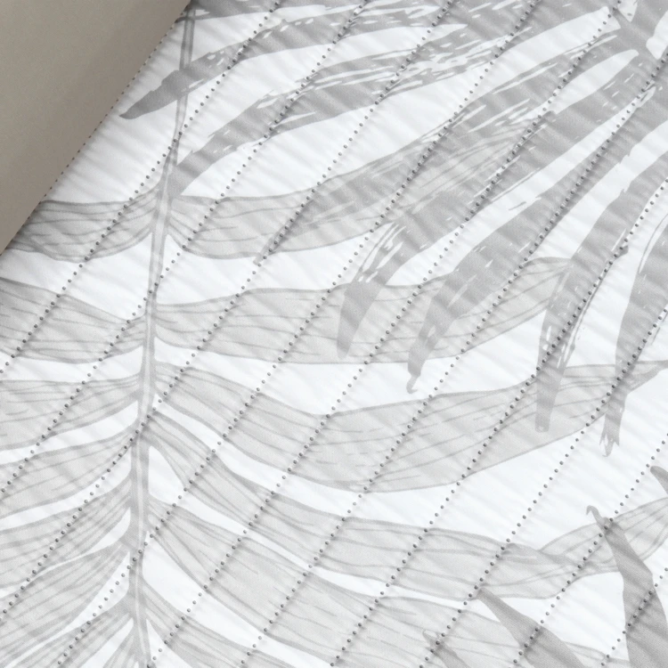 Matelas de plage avec repose-tête feuillage