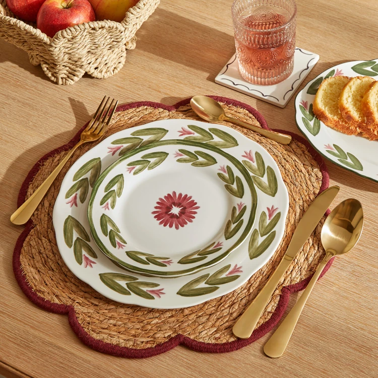 Mantel individual de junco trenzado con forma floral
