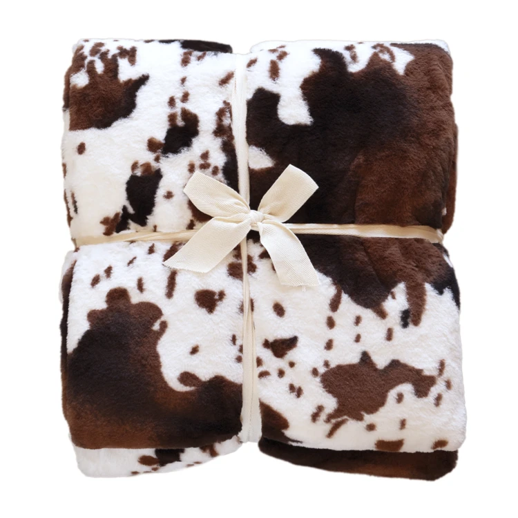 Plaid doux à motif peau de vache avec dos en velours