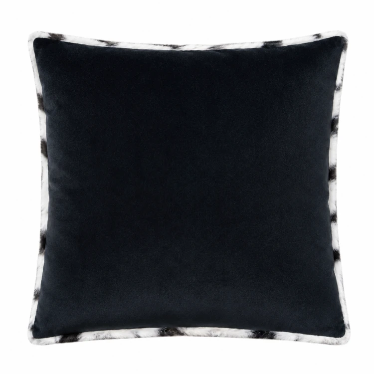 Coussin garni à motif zèbre avec dos en velours
