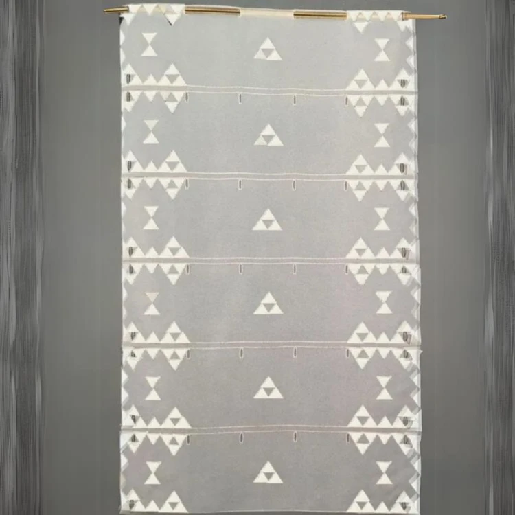 Modulable en voile brodé de triangles colorés