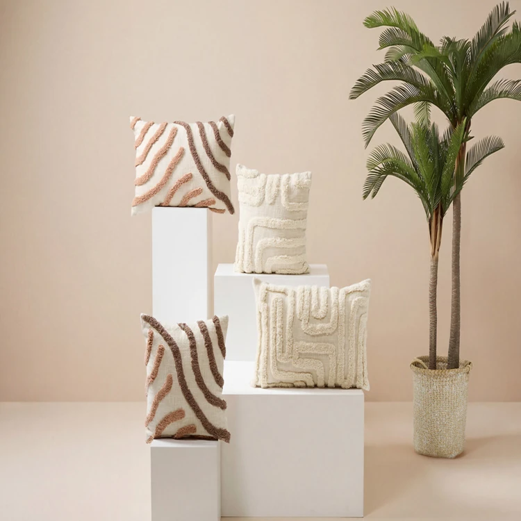 Coussin décoratif tufté en coton à motifs en relief