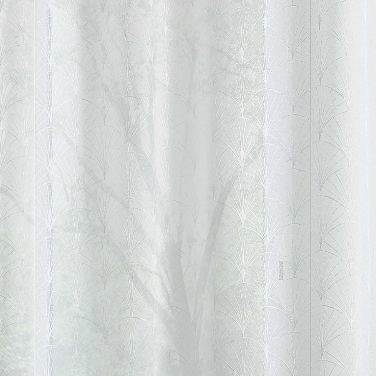 Par de pequeñas cortinas bordadas al estilo art déco