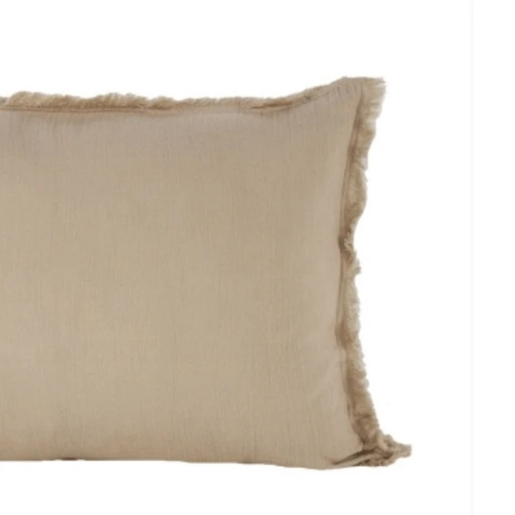 Coussin à franges en coton