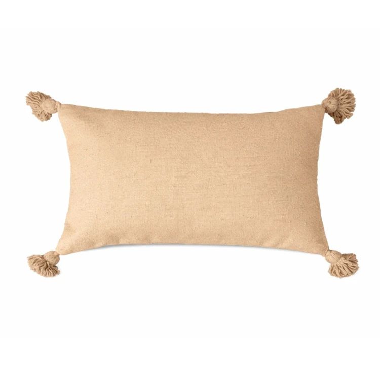 Copricuscino in lana con nappe