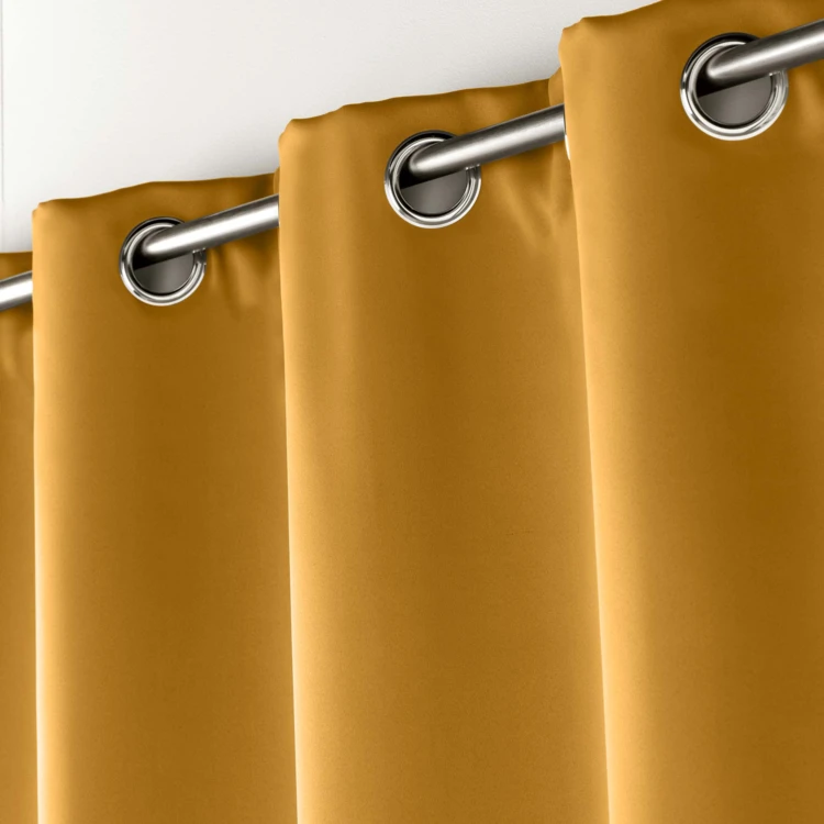 Rideau occultant uni à oeillets